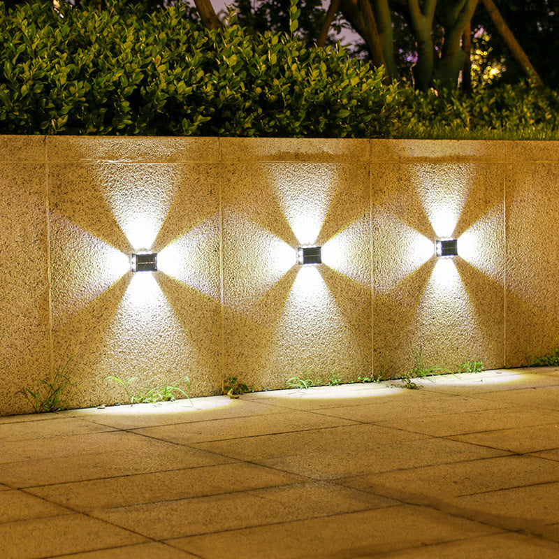 Modern solar-powered wall-mounted outdoor luminaire
