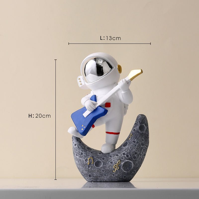 Cosmic Melodies Collection: Nordic Resin Astronaut Figurines - A Symphony in Space - Max&Mark Home Decor